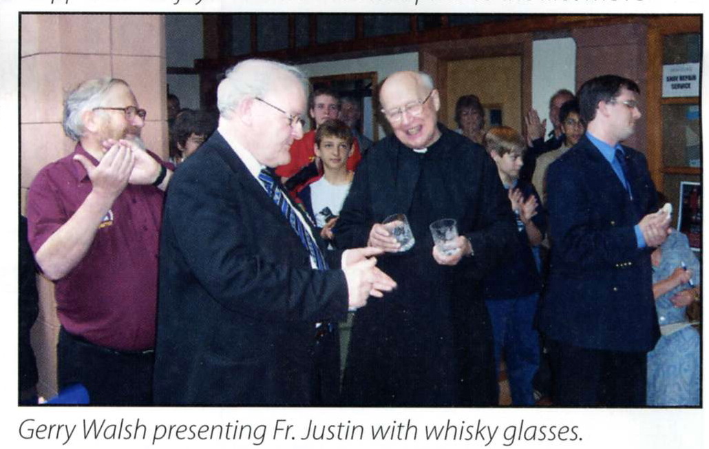 Justin being presented with whisky glasses